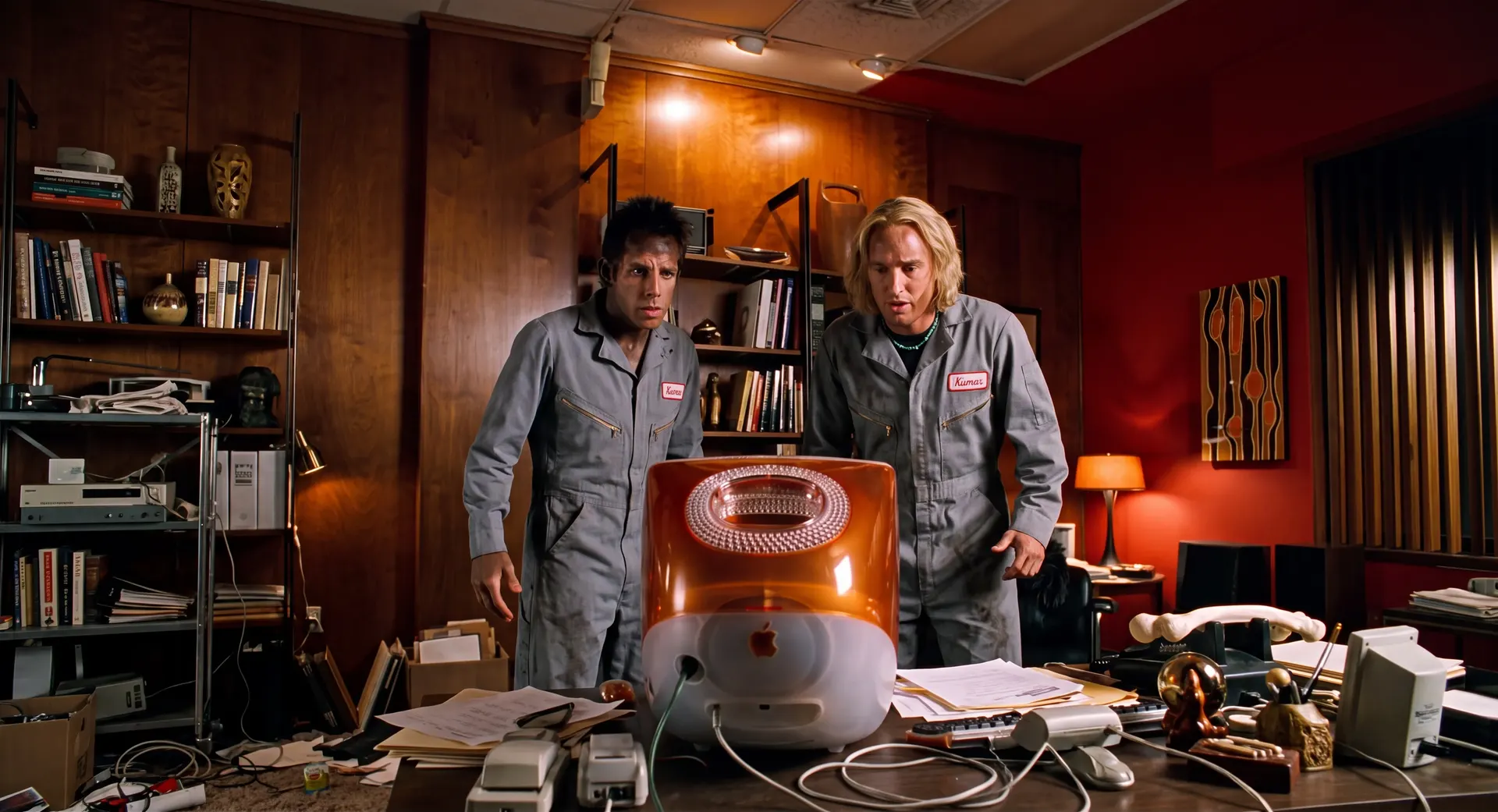 Derek and Hansel trying to get the files out of an orange iMac.